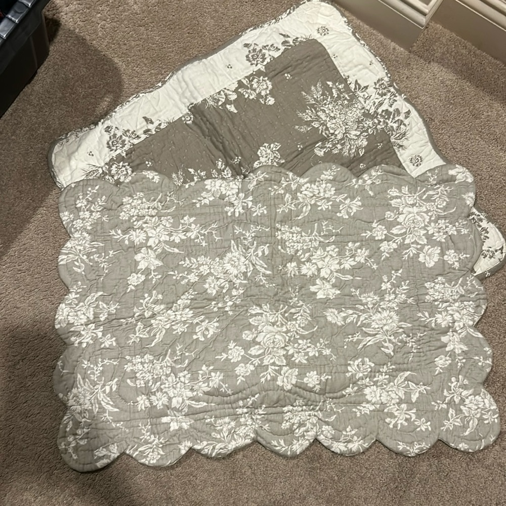 Set of Blanc d’ivoire quilted pillow cases. Taupe and cream floral pattern.